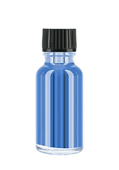 Image showing Bottle of blue liquid isolated