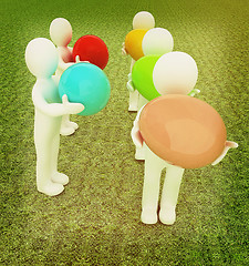 Image showing 3d small persons holds the big Easter egg in a hand. 3d image. O