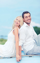 Image showing smiling couple at sea side