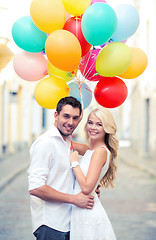 Image showing couple with colorful balloons