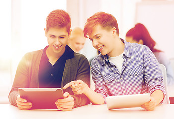 Image showing students looking at tablet pc in lecture at school