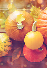 Image showing close up of pumpkins on wooden table at home