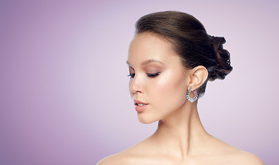 Image showing close up of beautiful woman face with earring