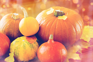 Image showing close up of pumpkins on wooden table at home