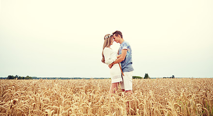 Image showing happy smiling young hippie couple outdoors