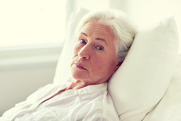 Image showing senior woman patient lying in bed at hospital ward