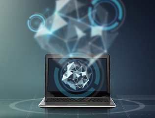 Image showing laptop with low poly shape projection 