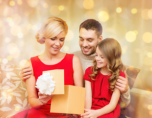 Image showing happy family opening gift box