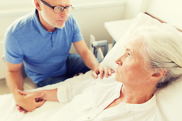 Image showing senior couple meeting at hospital ward