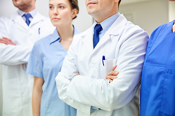 Image showing close up of medics or doctors at hospital corridor