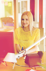 Image showing businesswoman with computer and phone at office