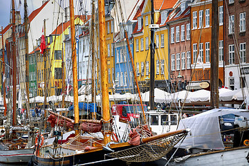 Image showing COPENHAGEN, DENMARK - AUGUST 15, 2016: Boats in the docks Nyhavn