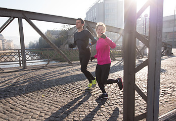 Image showing young  couple jogging