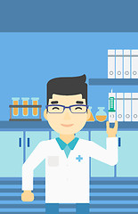 Image showing Laboratory assistant with syringe in lab.