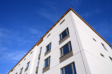 Image showing  shot of a facade of a new building at blue sky