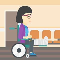 Image showing Woman with broken leg sitting in wheelchair.