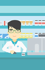 Image showing Pharmacist at counter with cash box.