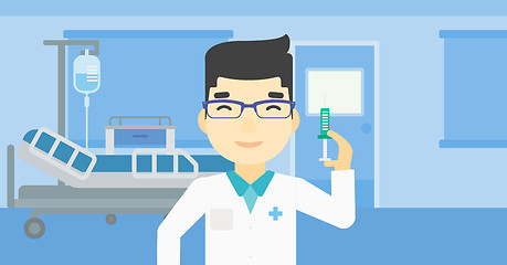 Image showing Doctor with syringe in hospital ward.