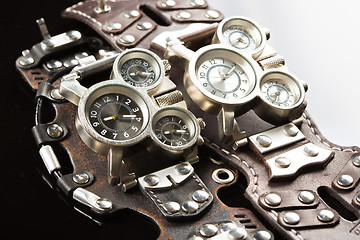 Image showing unusual watches. several alternatives dials