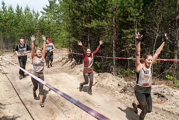Image showing Women run between stages in extrim race.Tyumen