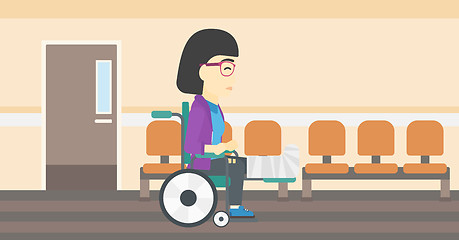 Image showing Woman with broken leg sitting in wheelchair.