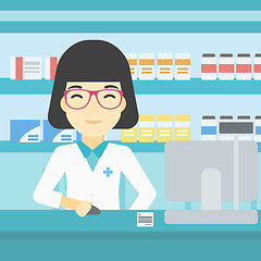 Image showing Pharmacist at counter with computer monitor.