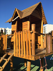 Image showing wooden playground structure in city