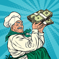 Image showing Retro chef with a bundle of money