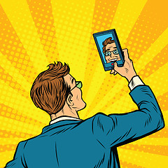 Image showing Retro man selfie on smartphone