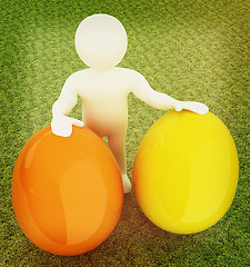 Image showing 3d small person holds the big Easter egg in a hand. 3d image. On