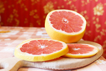 Image showing grapefruit red cut by pieces