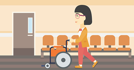 Image showing Woman pushing wheelchair vector illustration.