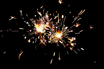 Image showing Bright festive New Year Christmas sparklers