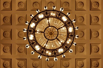 Image showing Chandelier on decoarted ceiling