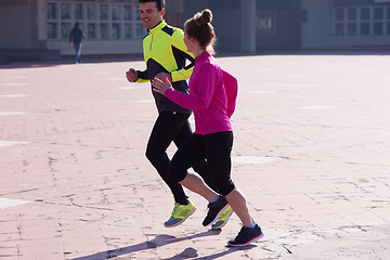 Image showing young  couple jogging