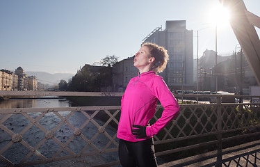 Image showing sporty woman jogging on morning