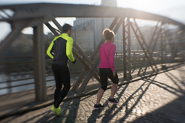 Image showing young  couple jogging