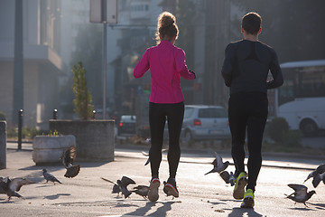 Image showing young  couple jogging