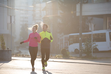 Image showing young  couple jogging