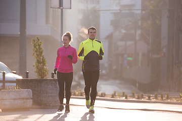 Image showing young  couple jogging