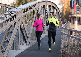 Image showing young  couple jogging