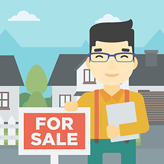 Image showing Real estate agent offering house.