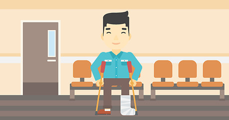 Image showing Man with broken leg and crutches.