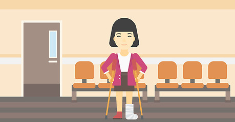 Image showing Woman with broken leg and crutches.