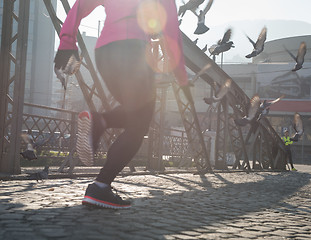 Image showing sporty woman jogging on morning