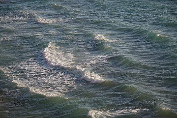 Image showing Light frothy waves of the black sea near shore