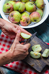 Image showing Cleaning rotten apples