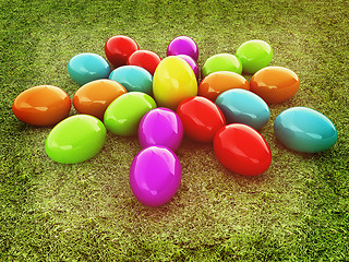 Image showing Colored Easter eggs as a flower on a green grass. 3D illustratio