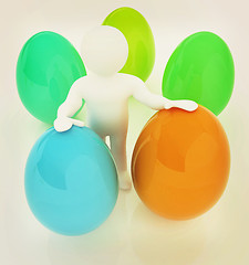 Image showing 3d small person holds the big Easter egg in a hand. 3d image.. 3