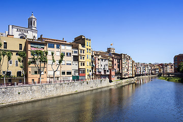 Image showing Girona picturesque small town with Colorful houses and ancient C